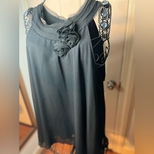 BLACK SLEEVELESS BLOUSE WITH FLOWER RUFFLE AND HIGH NECKLINE SIZE LARGE